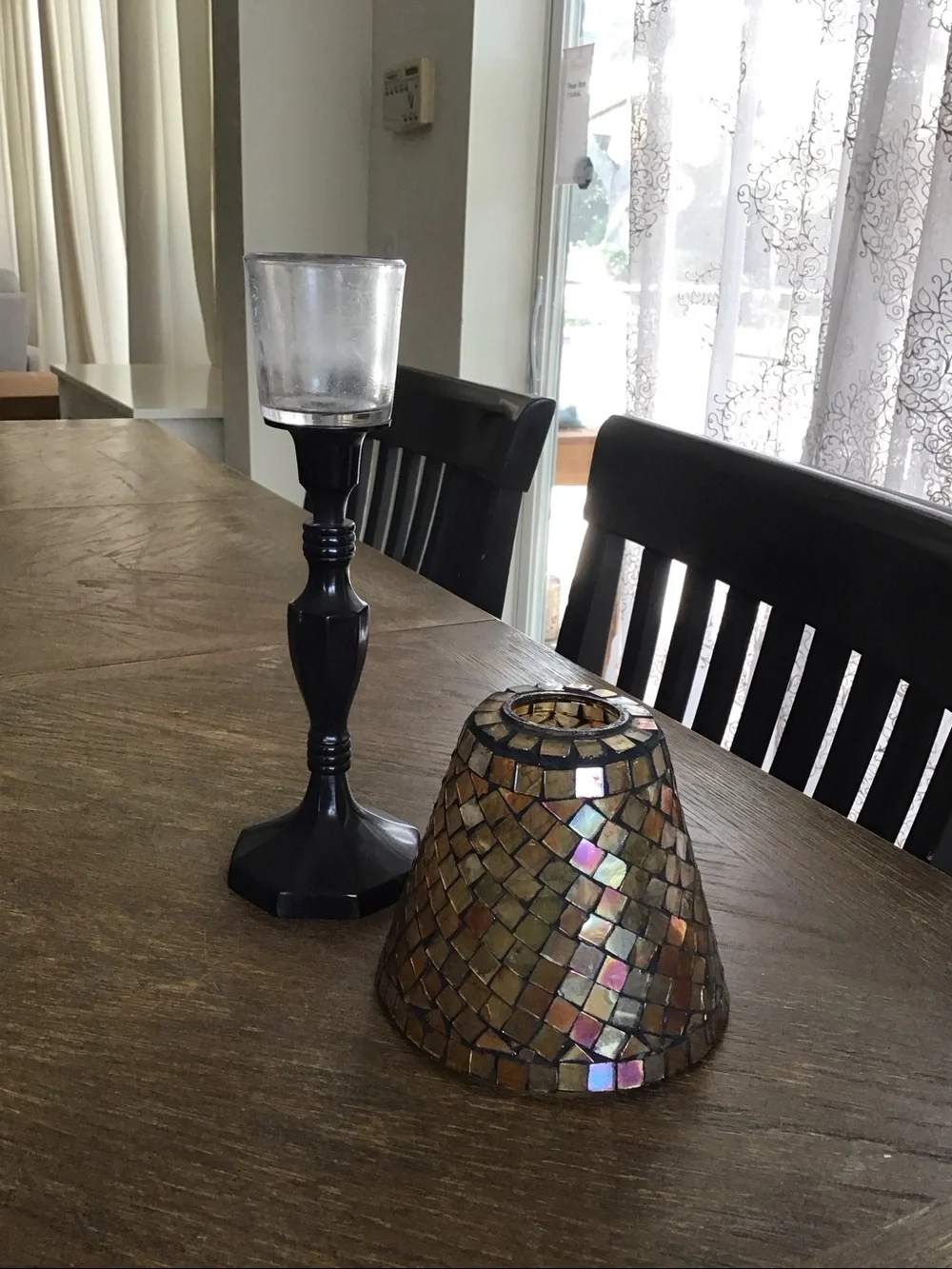 Mosaic tealight candle lamp featuring a stained glass shade.